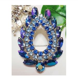 Blue opalescent brooch